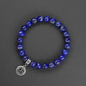 Lapis Lazuli natural gemstone bracelet with silver charm by Gems In Style Jewellery.