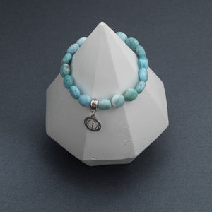 Larimar gemstone bracelet with silver charm by Gems In Style Jewellery