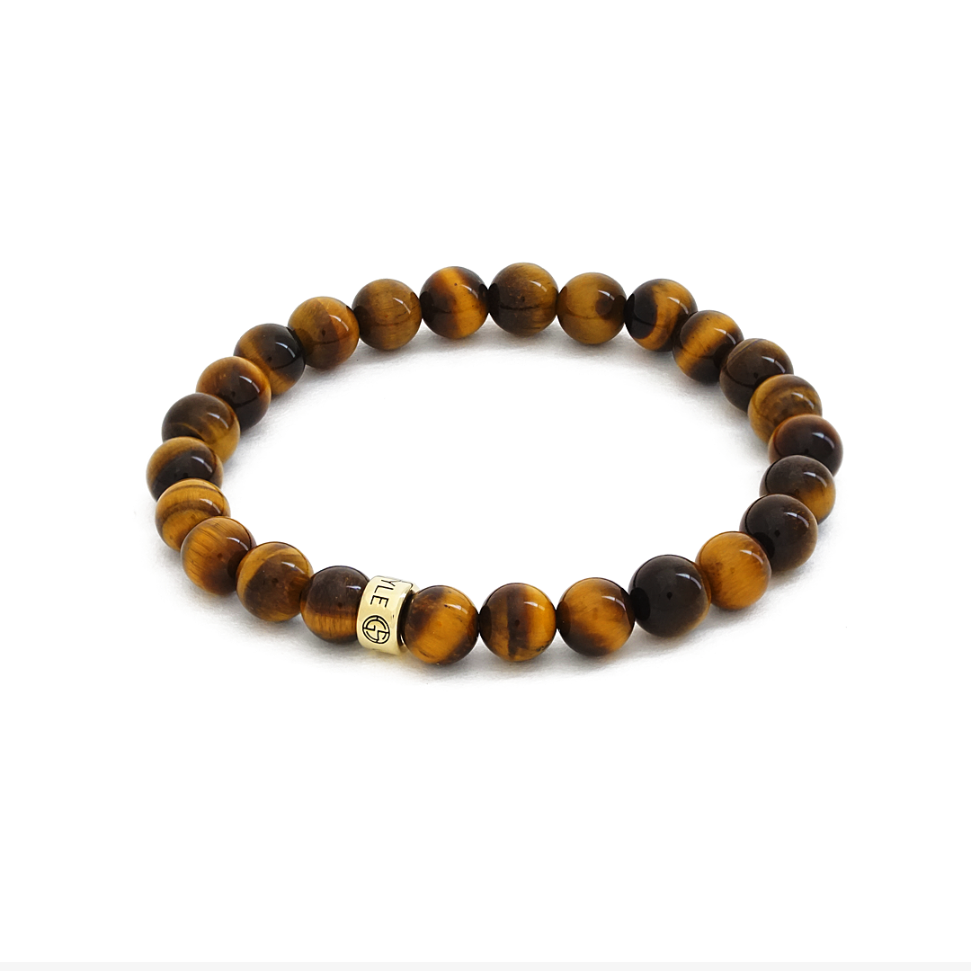 Tiger Eye natural gemstone bracelet with gold charm by Gems In Style Jewellery.