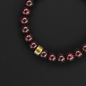 Garnet natural gemstone bracelet with branded gold charm by Gems In Style Jewellery. Customised size, comes in a gift box.