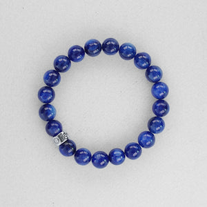 Blue Kyanite gemstone bracelet with silver charm by Gems In Style Jewellery.