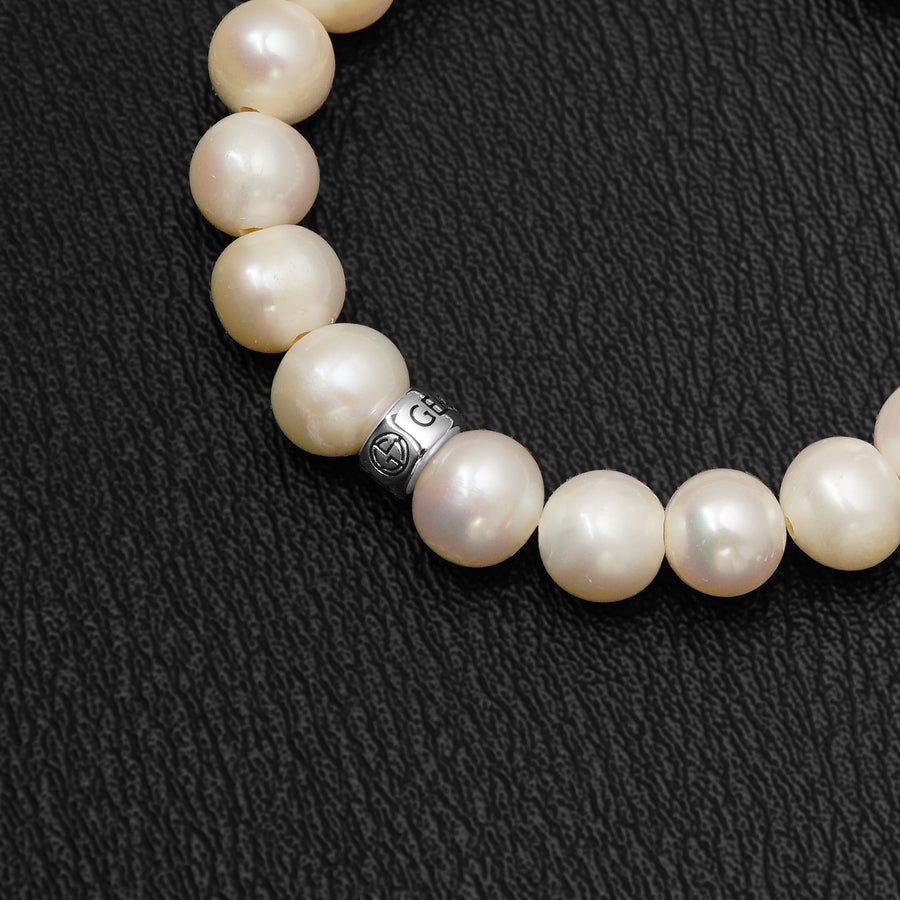 Freshwater Pearl gemstone bracelet with silver bead by Gems In Style Jewellery. 