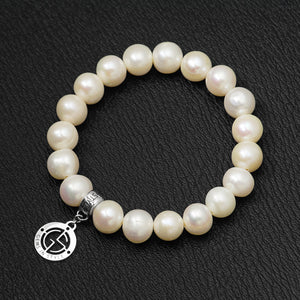 Freshwater Pearl gemstone bracelet with silver charm by Gems In Style Jewellery
