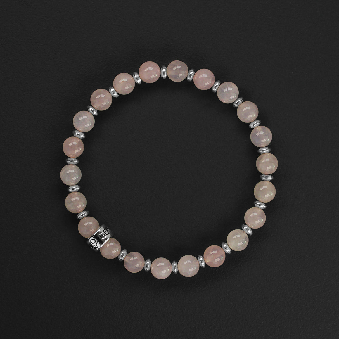 Rose Quartz natural gemstone bracelet with branded silver charm by Gems In Style Jewellery.