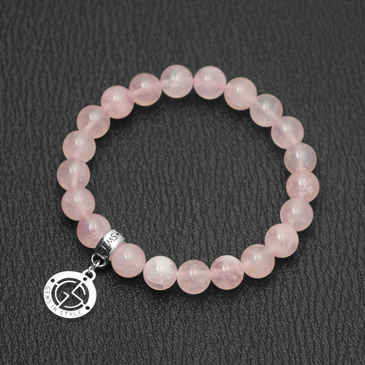 Madagascar Rose Quartz natural gemstone bracelet with branded silver charm by Gems In Style Jewellery.