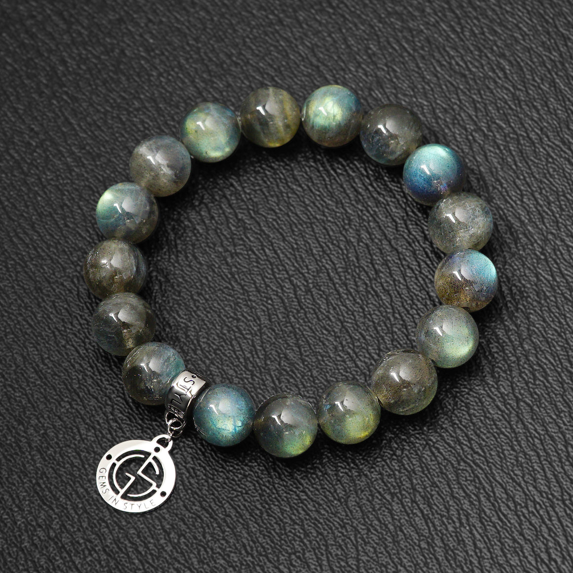 Labradorite gemstone bracelets with silver charm. High quality gemstone with strong colour flashes
