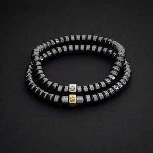 Hematite gemstone bracelets with gold and silver charms by Gems In Style Jewellery