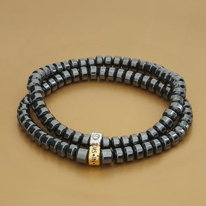 Hematite gemstone bracelets with gold and silver charms by Gems In Style Jewellery