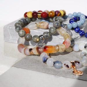 Natural gemstone bracelets with silver and gold charms by Gems In Style Jewellery