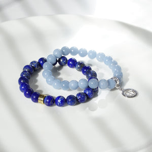 Lapis Lazuli and Angelite natural gemstone bracelets with gold and silver charms by Gems In Style Jewellery.