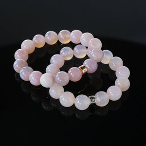 Natural Pink Agate gemstone bracelets with silver and rose gold charms by Gems In Style Jewellery.