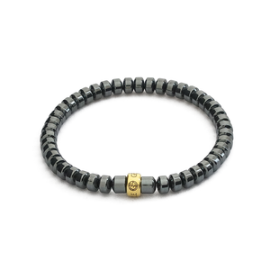 Hematite gemstone bracelet with gold charm by Gems In Style Jewellery. 